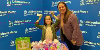 Olivia as a junion champion donating over 200 eggs to children inpatient at Children's Mercy during our 2025 Egg Drop fundraiser.